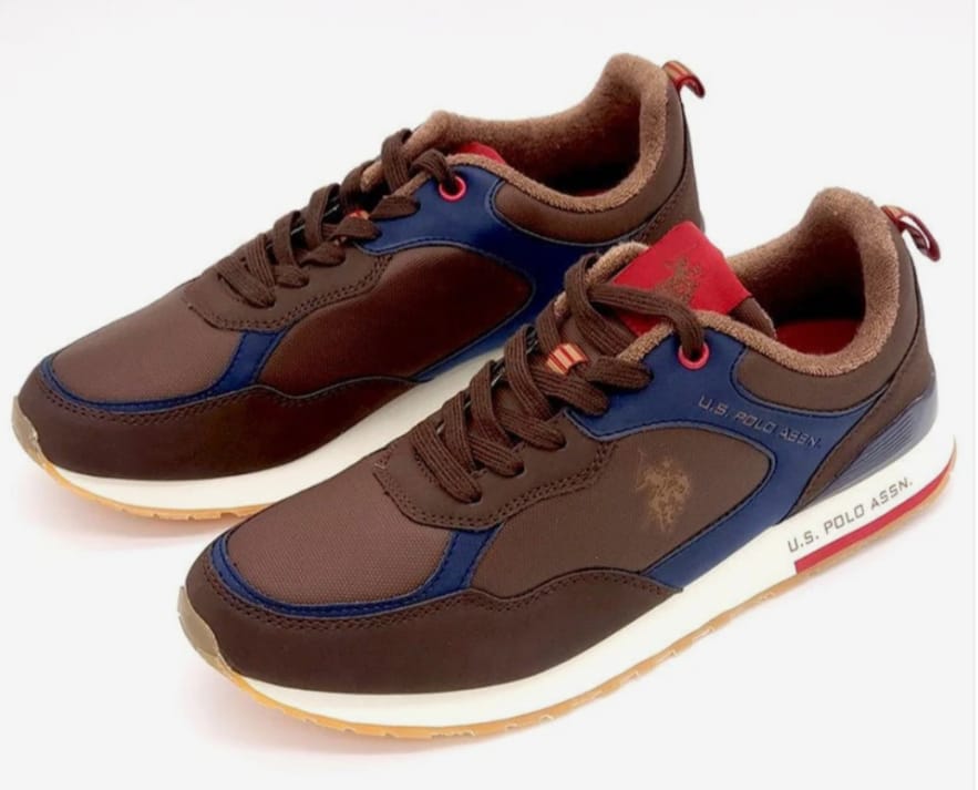 Sporty sneakers with a sleek design, crafted from durable synthetic materials for long-lasting wear.